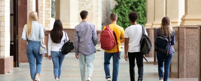 college students walking on campus.